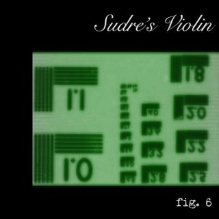A bright green rectangular block marked with numbers and lines. I think it's from a microfische reader.