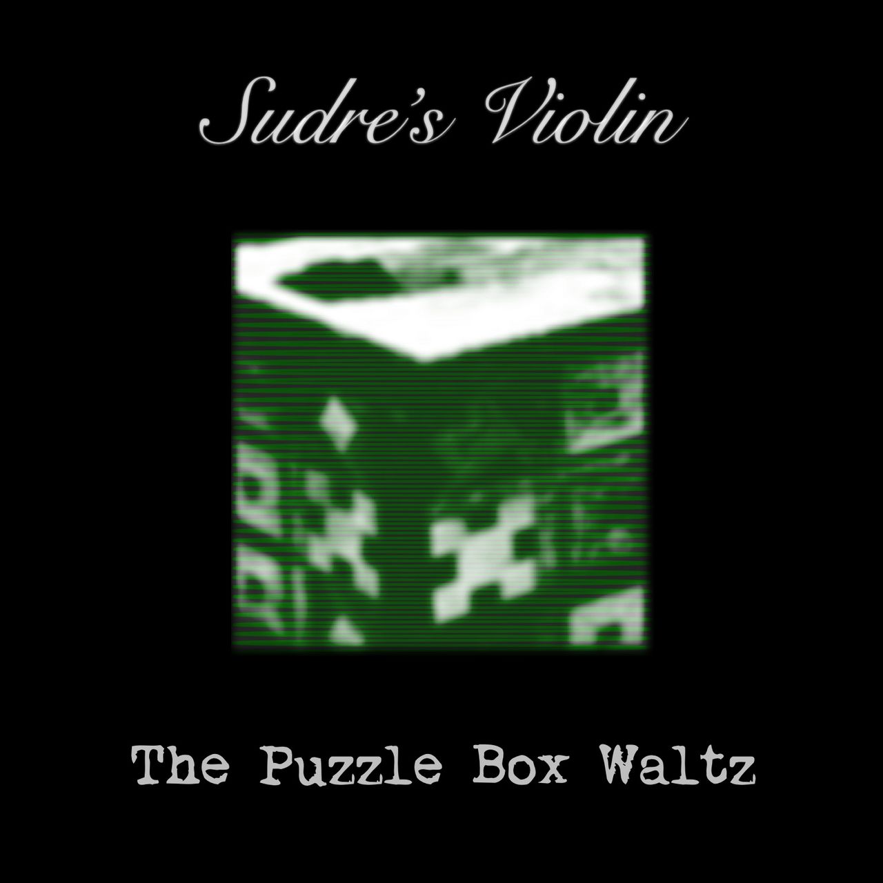 Green video-artifact image of an antique puzzle box.