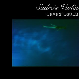 Blue and green video-artifact image of a woman with floating in a dark body of clear water.