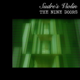 A confusing green video image of a doorway-lined hallway.